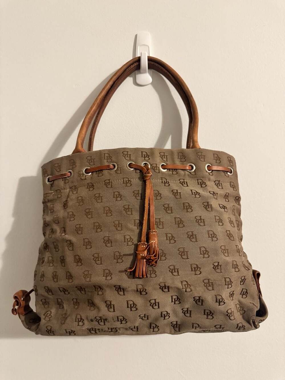 Dooney & Bourke Signature Logo Canvas Tassel Bucket Bag